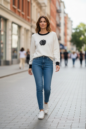 Pull bicolore à fleurs
