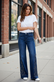 Jeans large strass fleurs